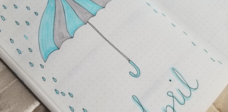 April 2019 Cover Page with Umbrella and Rain Drops - April 2019 Bullet Journal Setup